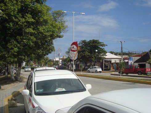 The main road that separates the town of Tulum. Now dressed up with Christmas decorations.