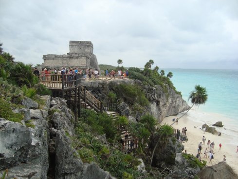 The crowded beach at the Tulum archeological site.