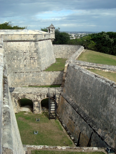 The moat surrounding the fort. you can just about see Campeche in the distance, behind the trees.