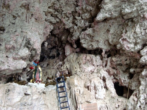 A shrine inside the Cueva de Colores, named after the pink markings on the cave walls formed by minerals.