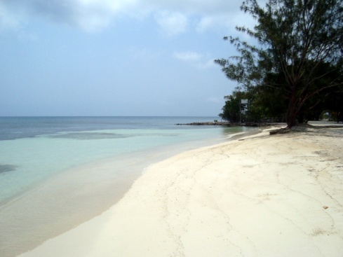 The white sand at the far side of Chepes Beach.