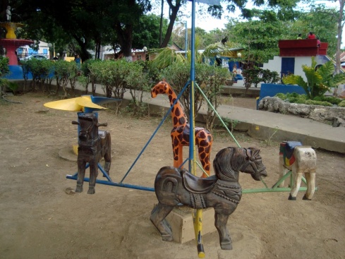 An old-style merry-go-round in the Parque Central, Moyogalpa.
