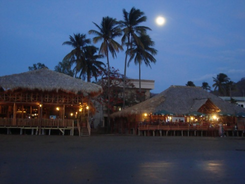 The moon rising behind the beach in San Juan del Sur.