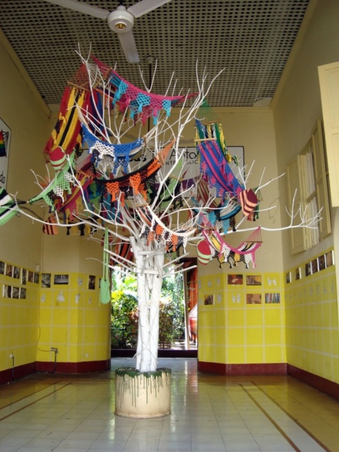 A display of mini hammocks made by the deaf and dumb.