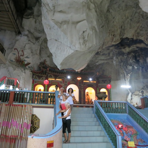 Entering a cave temple.