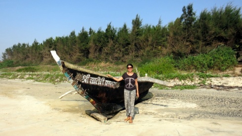 A fishing boat on Tarkarli beach near the pine forest.
