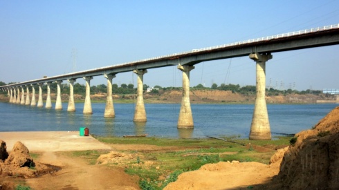 A long bridge that crosses the river a few kilometers outside Maheshwar.